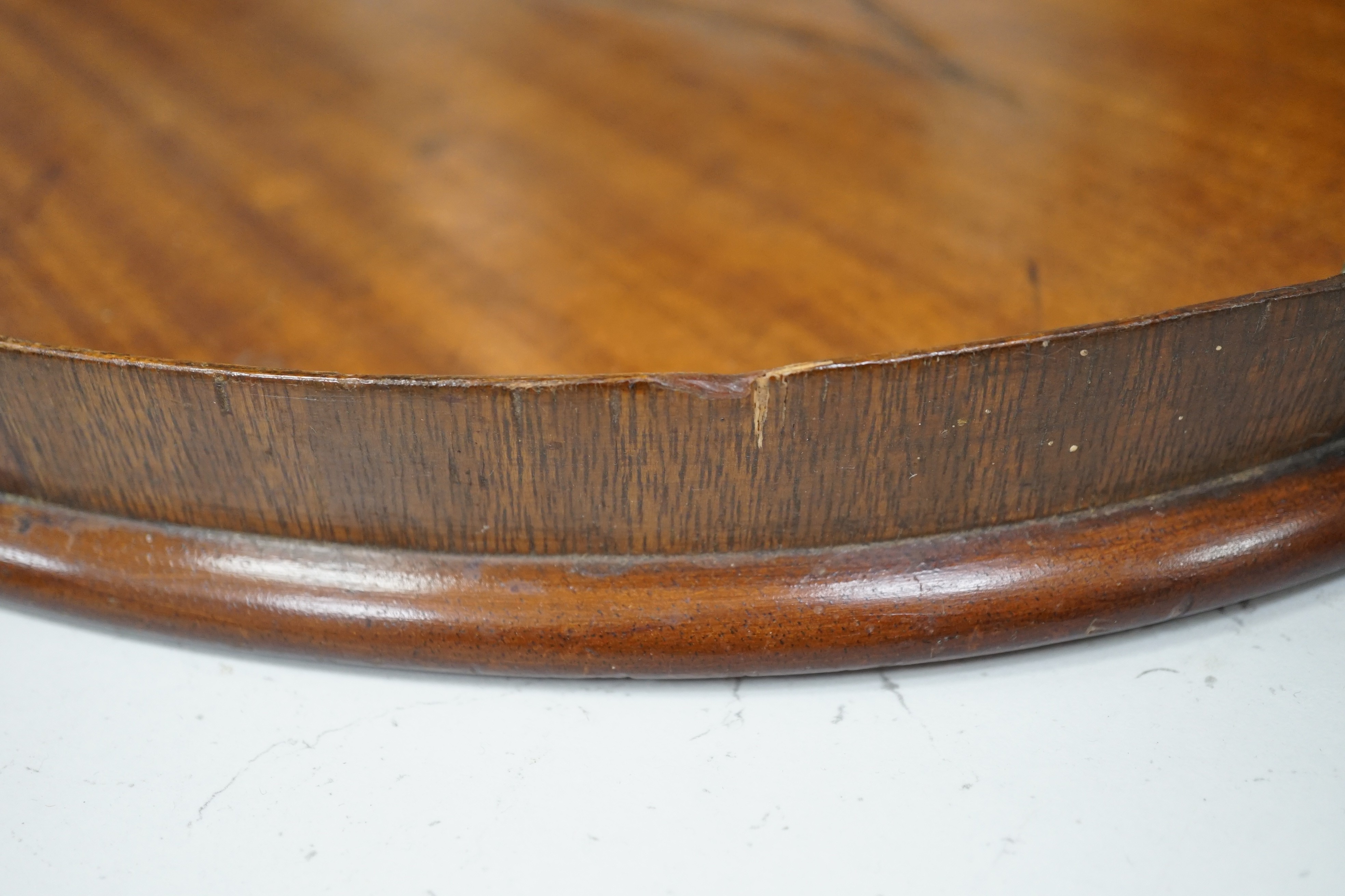 A large oval marquetry satinwood tray. 66cm wide